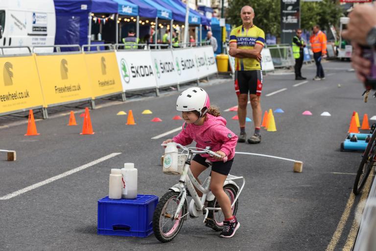 Child competing in one of the activities organised as part of the Tour Series