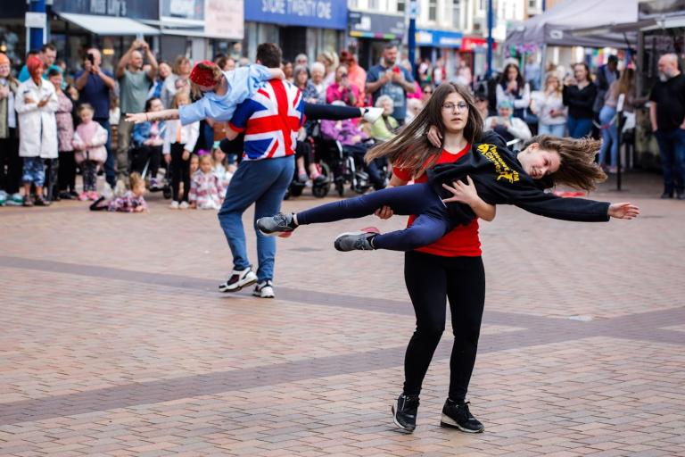 Dancers giving a dance performance at the flash mob show on Redcar High Street in celebration of the Platinum Jubilee.