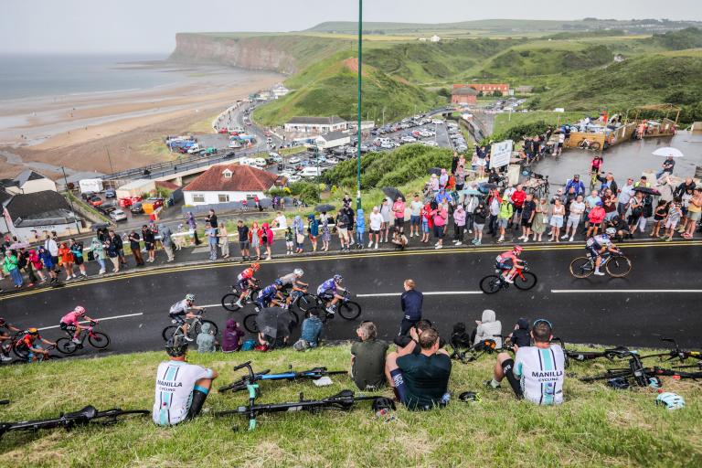 Cyclists at the Road Race going up the Saltburn bank in the rain. 